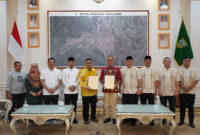 Para pejabat Imigrasi Sumbar dan Padang Panjang usai pertemuan di Padang Panjang.
