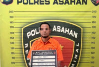Potret tersangka HJ (45), yang menganiaya istrinya di Asahan, Kamis (9/10/2025).  Foto: Dok. Humas Polres Asahan