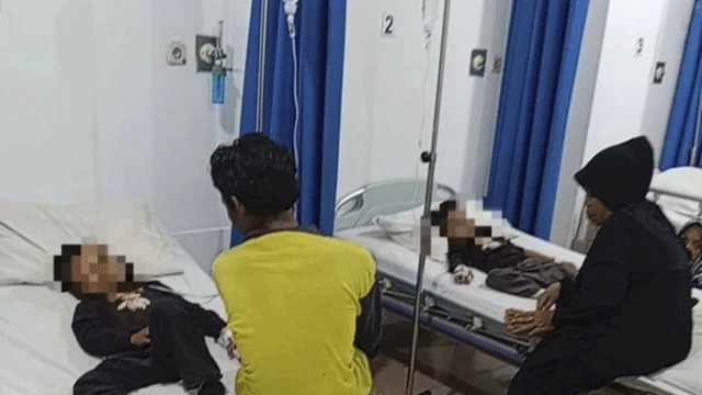 Kakak-beradik di Kampung Piket, Desa Sukatenang, Kecamatan Sukawangi, Kabupaten Bekasi, diserang kawanan tawon pada Rabu (29/10/2025). Foto: Dok. Istimewa
