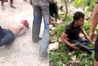 Dua pencuri yang diamuk massa. | Foto: Dok Istimewa
